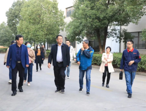 省发改委调研组莅临米兰网_米兰（中国）工厂调研